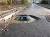 potholefilledwithwaterk_zps7258504d.jpg