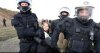 greta-thunberg-carried-away-by-police-at-german-mine-protest-475509178.jpg